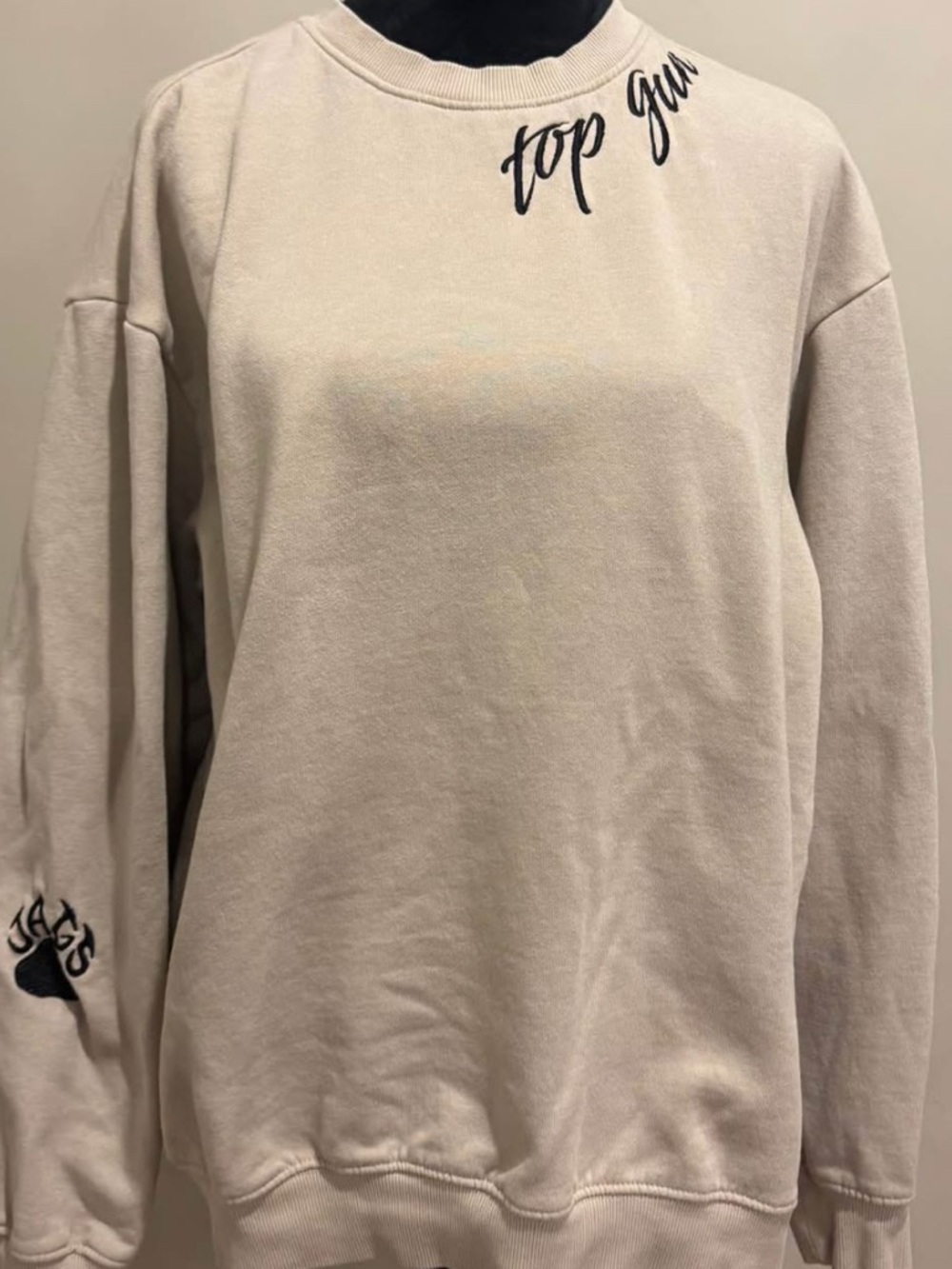 Top Gun Women’s Cream Crewneck Sweatshirt with Subtle Script Detail